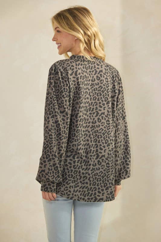 ET7975-14 LONG SLEEVE V NECK ANIMAL URBAN RIB TOP displayed on a model from the back, showcasing its animal print design.