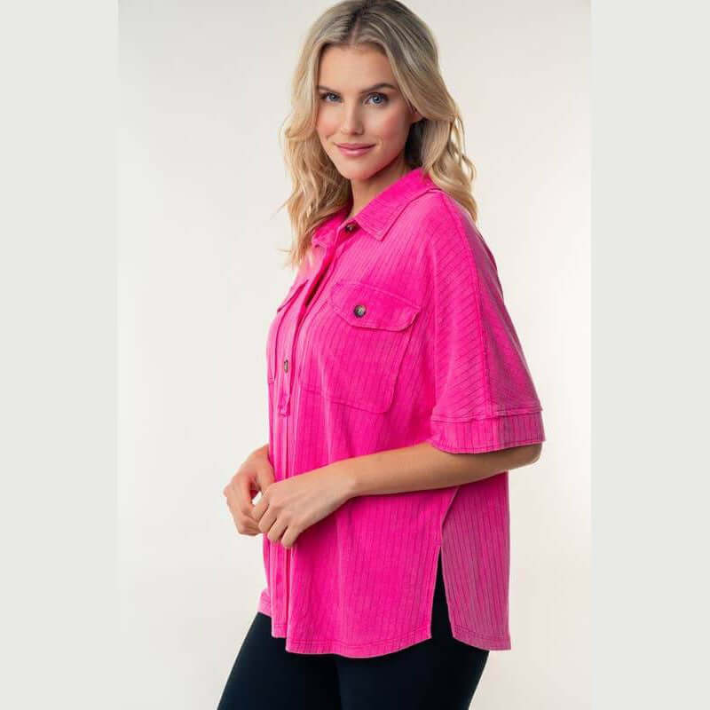 Bright pink Downtown Breeze Top with collared design and flap pockets, perfect for casual and work settings.