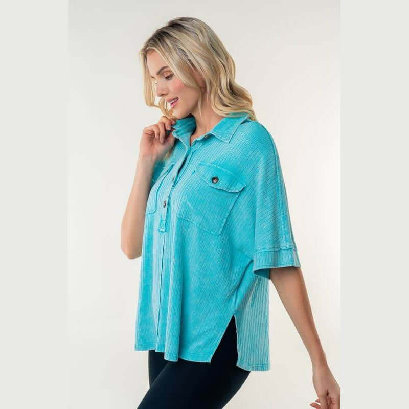 Aqua Downtown Breeze Top featuring a collared design, half sleeves, and stylish flap pockets.