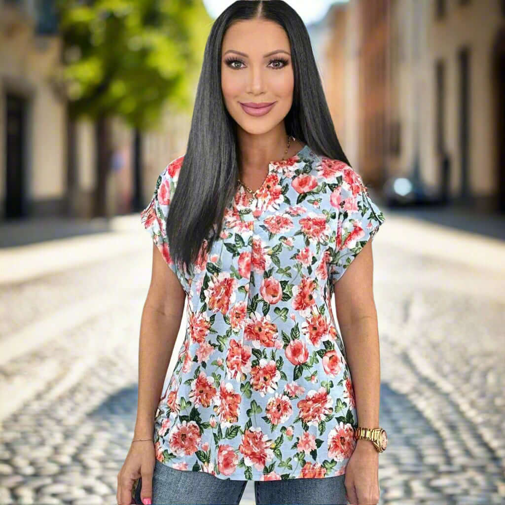 Bright floral Lizzy 2 Top by Dear Scarlett, featuring a classic notch neckline and flutter sleeves.