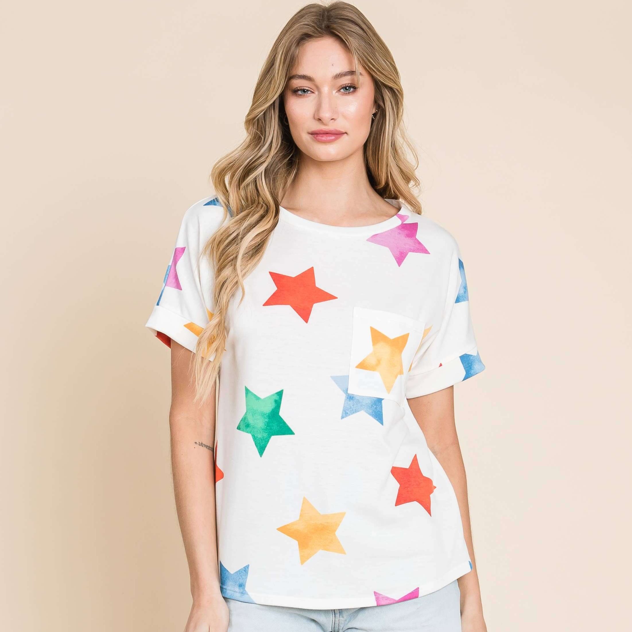 Colorful Cosmic Canvas Tee with star prints, designed for comfort and style with a classic crewneck and chest pocket.