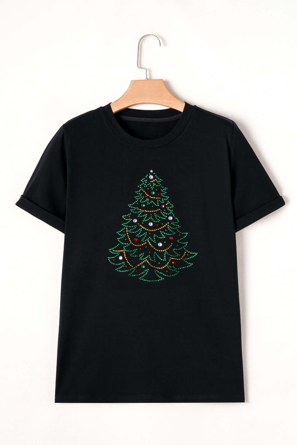 Black t-shirt featuring a fully studded Christmas tree design, perfect for festive fashion.