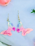 Colorful LOVER ERA BUTTERFLY earrings, 1.75" length, acrylic, perfect for making a bold fashion statement.