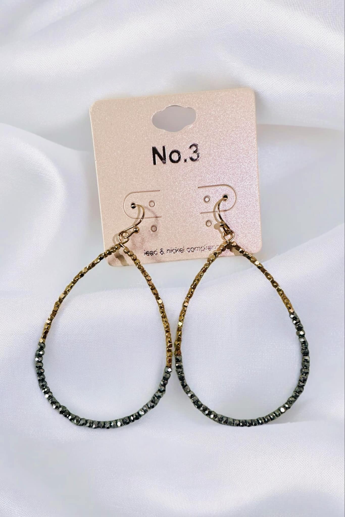 Sharla Teardrop Beaded Earrings by No. 3 Jewelry, featuring colorful beads and gold-toned accents in a playful design.