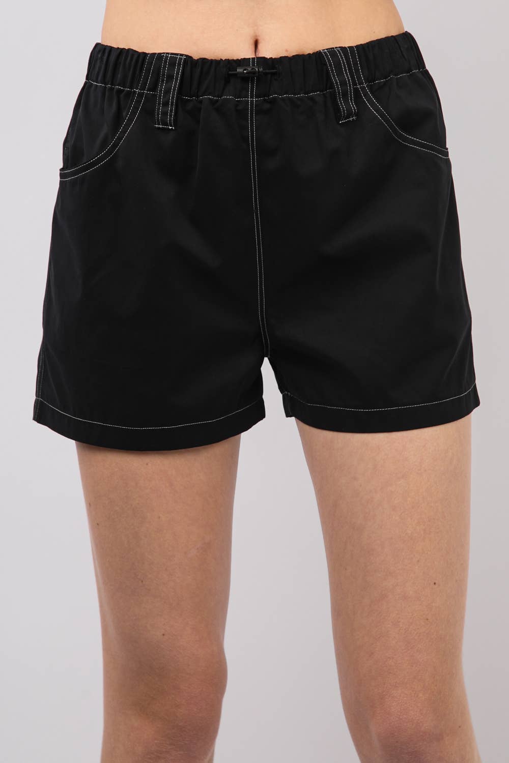 Stylish black Play It Cool shorts with elastic waistband and adjustable drawstring for comfort and versatility.