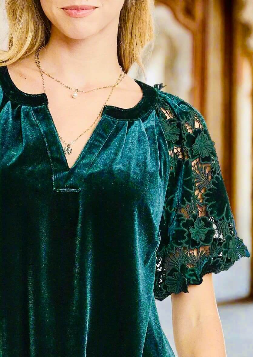 Umgee QUIET JOY Velvet Top in Dark Teal Green featuring lace sleeves and a split neckline.