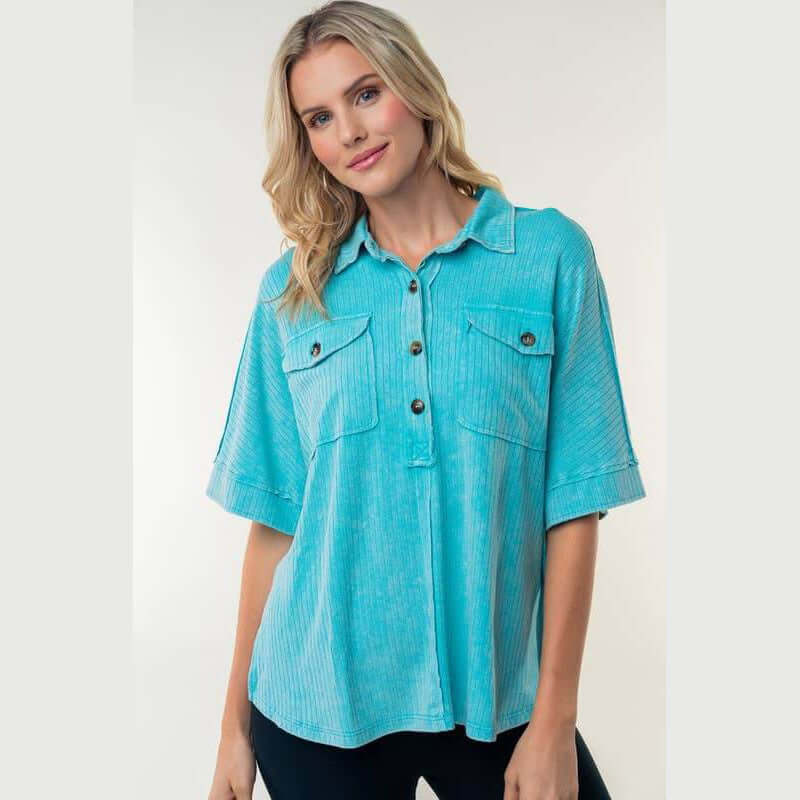 Aqua Downtown Breeze Top featuring a collared design, half-button placket, and side slits for an easygoing style.