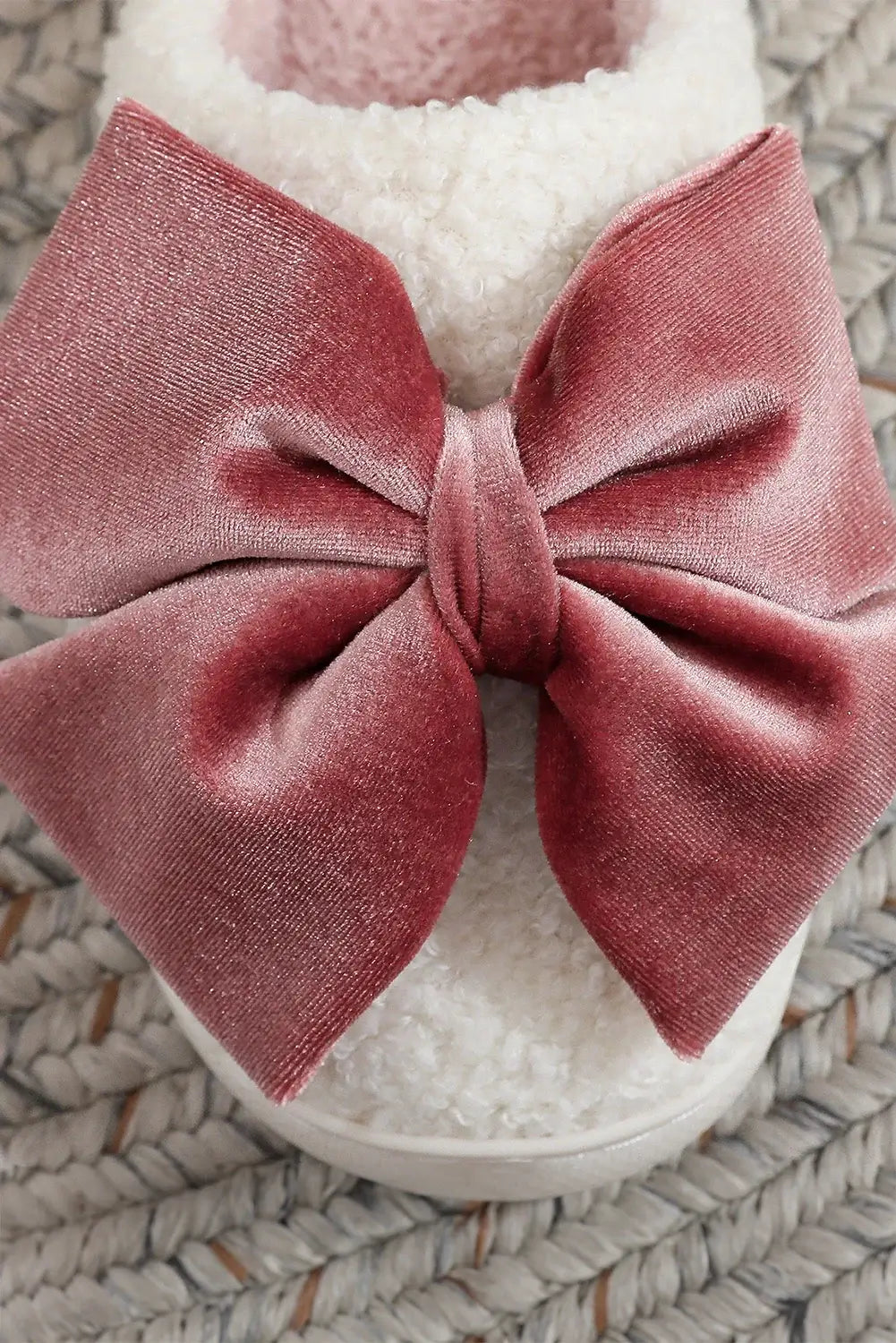 SWEET RETREAT BOW SLIPPERS featuring plush sherpa and oversized velvet bow, perfect for cozy winter lounging.
