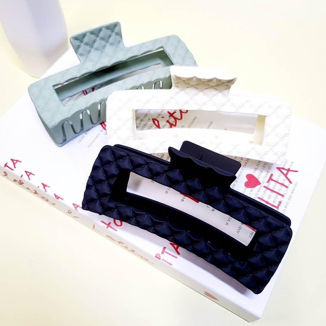 Everyday Luxe XL Hair Clips in green, white, and black with quilted texture, perfect for thick or curly hair.