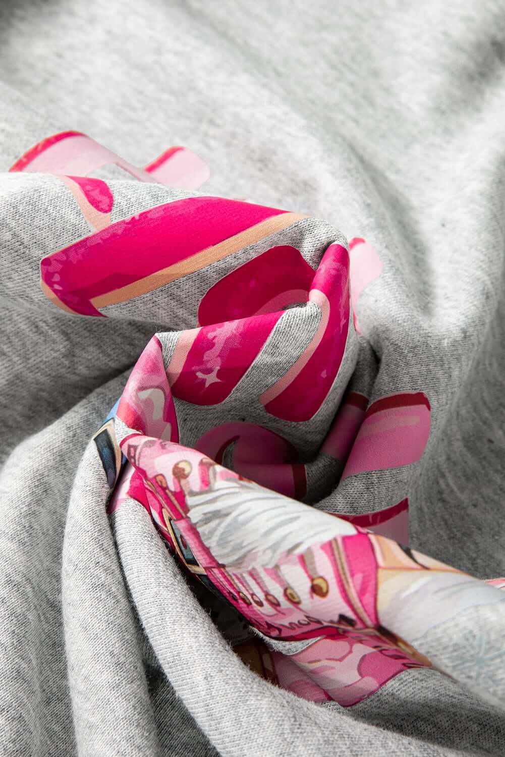 Close-up of the HOLLY JOLLY NUTCRACKER sweatshirt's soft fabric featuring vibrant nutcracker prints.