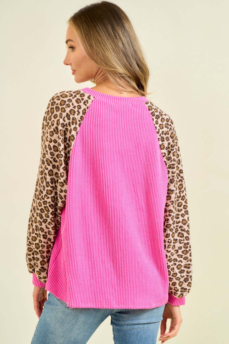 WILD CRUSH TOP - Lovely Melody showcasing hot pink ribbed body with leopard print balloon sleeves.