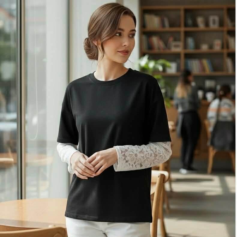 COFFEE & CREAM TOP featuring a black tee with lace long sleeve inserts, perfect for casual outings.