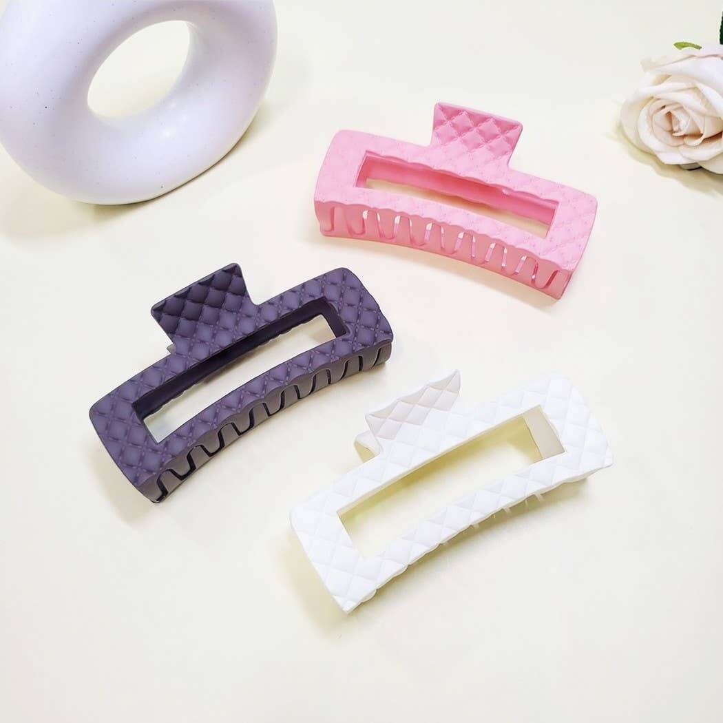 Everyday Luxe XL Hair Clips in pink, purple, and white with quilted design for stylish hair styling.