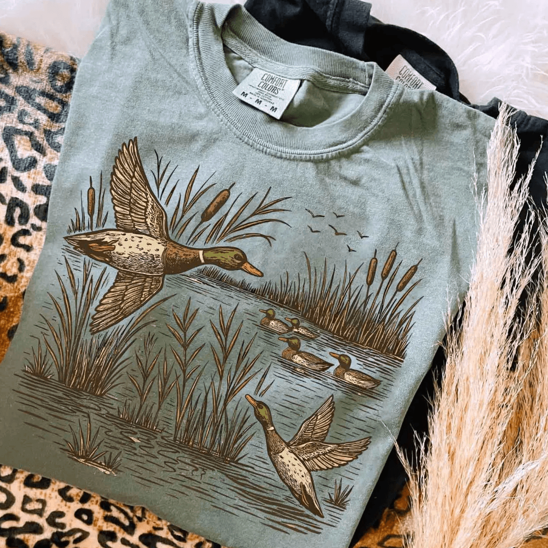 TAKE FLIGHT TEE - The Lattimore Claim featuring a waterfowl graphic on a soft mineral prewashed cotton tee.