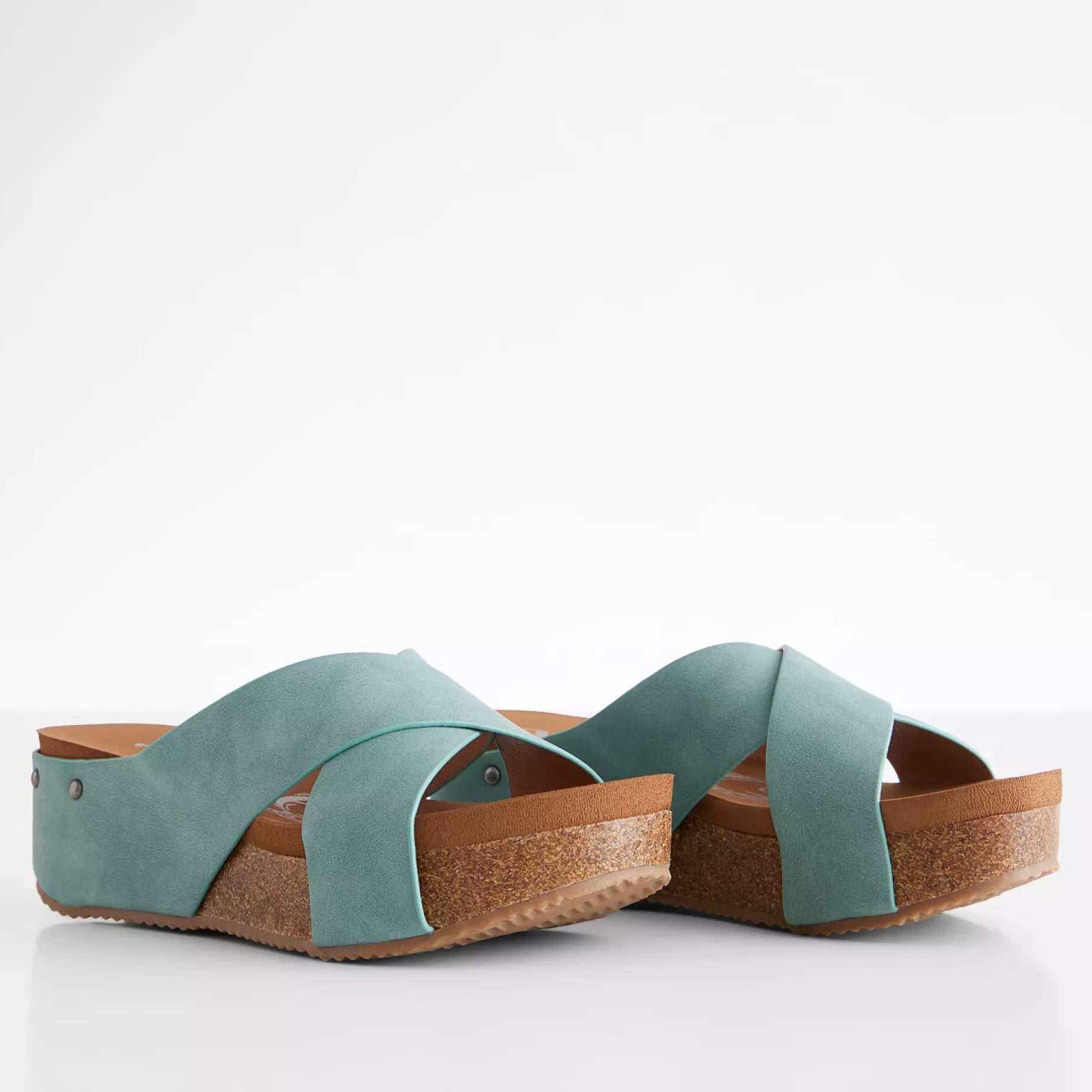 Teal platform wedge sandals by Very G with distressed faux leather straps and cork wedge heel.