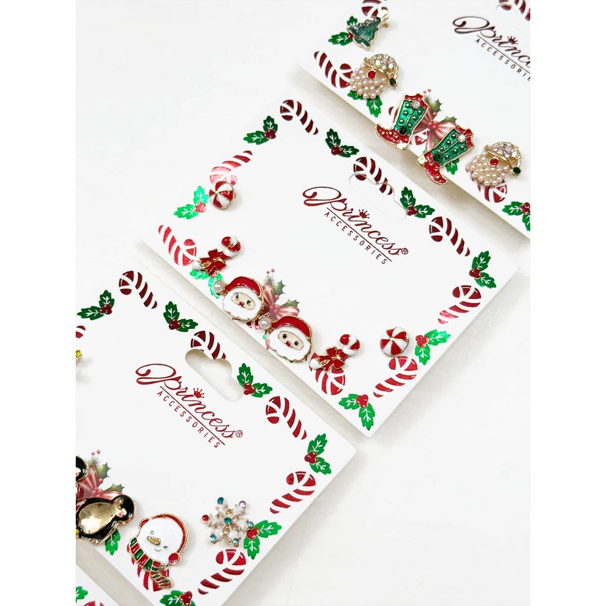 Cute Christmas Theme Sparkly Earrings displayed on festive cards with holiday designs.