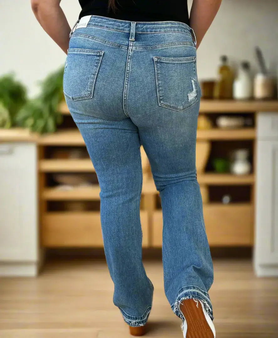 Back view of Judy Blue Irena bootcut jeans in light wash, designed for comfort and style in plus sizes.