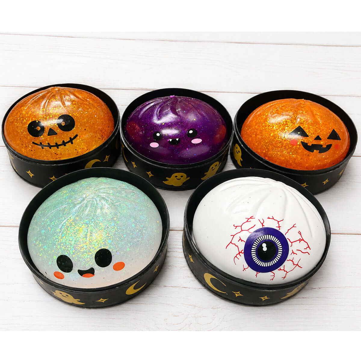 HALLOWEEN DUMPLING assortment featuring spooky designs like skeleton, ghost, pumpkin, and eyeball.