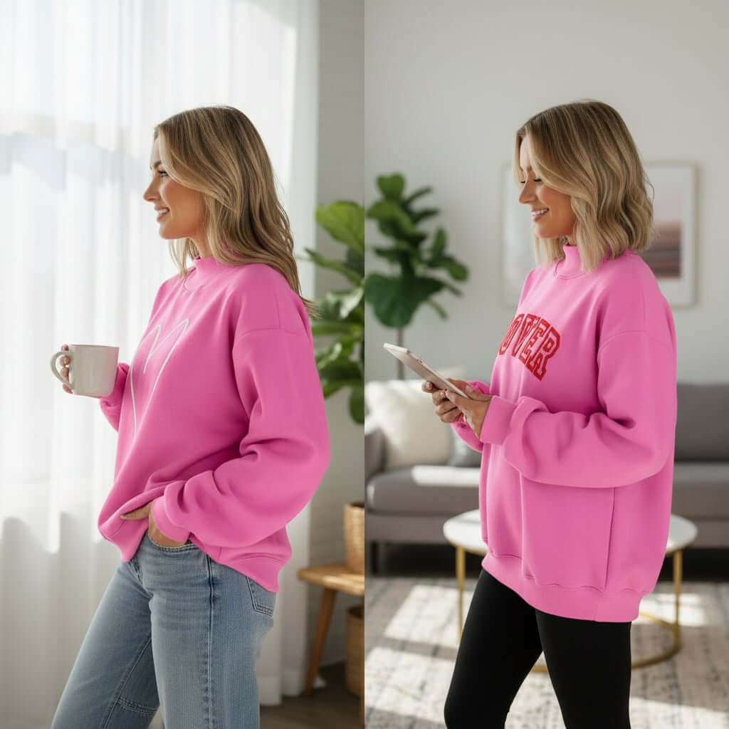 DOUBLE THE LOVE REVERSIBLE PULLOVER displayed in bright pink with LOVER script and heart graphic on each side.