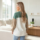 MOUNTAIN AIR SWEATER featuring a stylish color block design in marina blue, khaki, and cream.