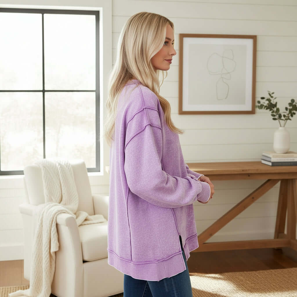 WEEKEND CREW PULLOVER - Zenana in violet, worn by a model with long blonde hair in a cozy indoor setting.