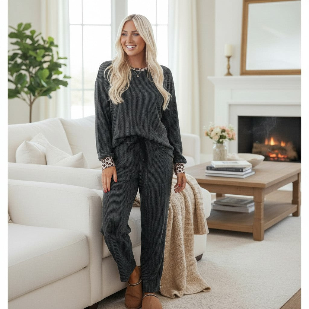 FELINE FAB PANTS SET showcasing a model in a cozy Carbon Grey twisted ribbed 2-piece pant set with leopard accents.