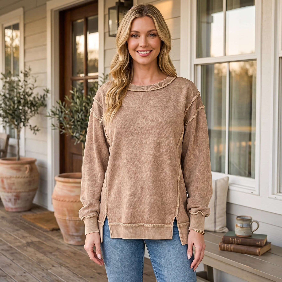 WEEKEND COZY PULLOVER (3 colors) worn by a model in a relaxed setting, showcasing its soft, mineral wash fabric.