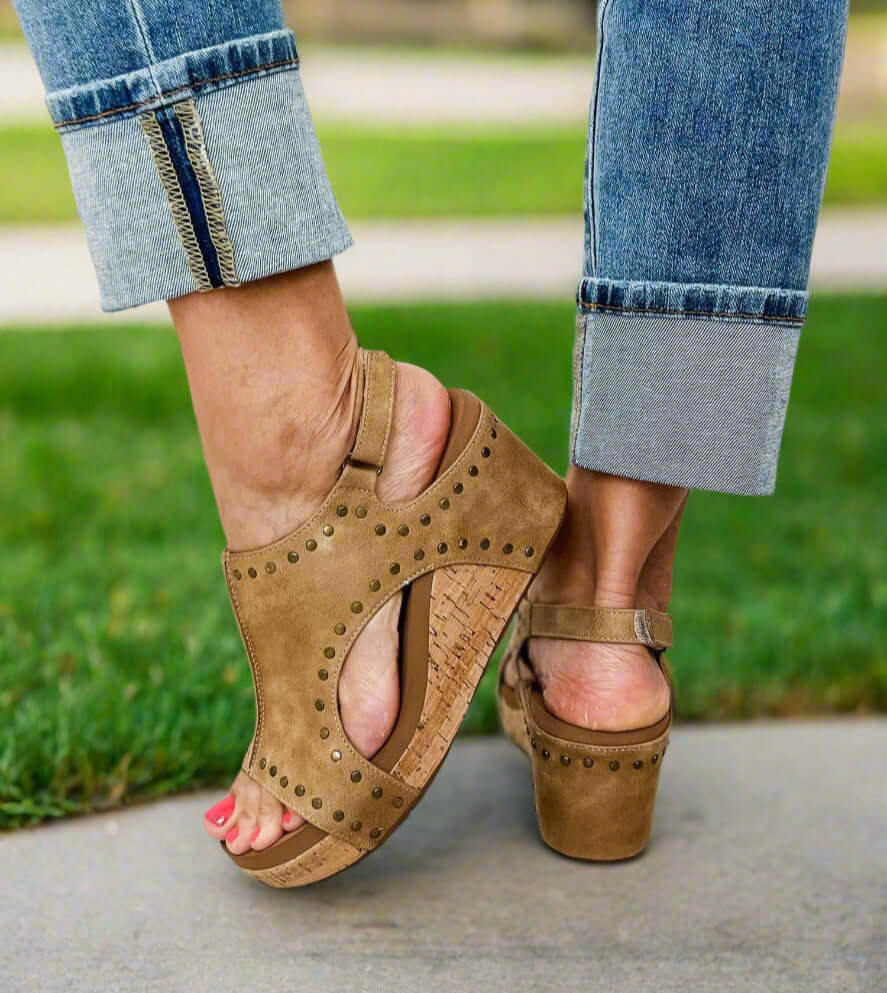 Corky's Carley studded wedges in tan, showcasing a stylish design and comfortable cork wedge heel.