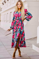 Elegant floral dress with balloon sleeves and slit, perfect for a stylish daytime look. Ideal for young women.