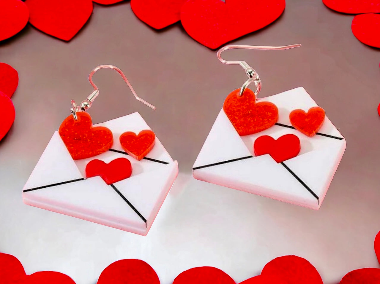 Adorable LOVE LETTER earrings featuring red heart adorned envelopes for a romantic touch.