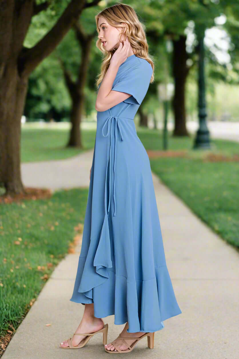 Stunning Breezy Blue Maxi Dress by BomBom with a high/low hem and wrap design, perfect for any occasion.