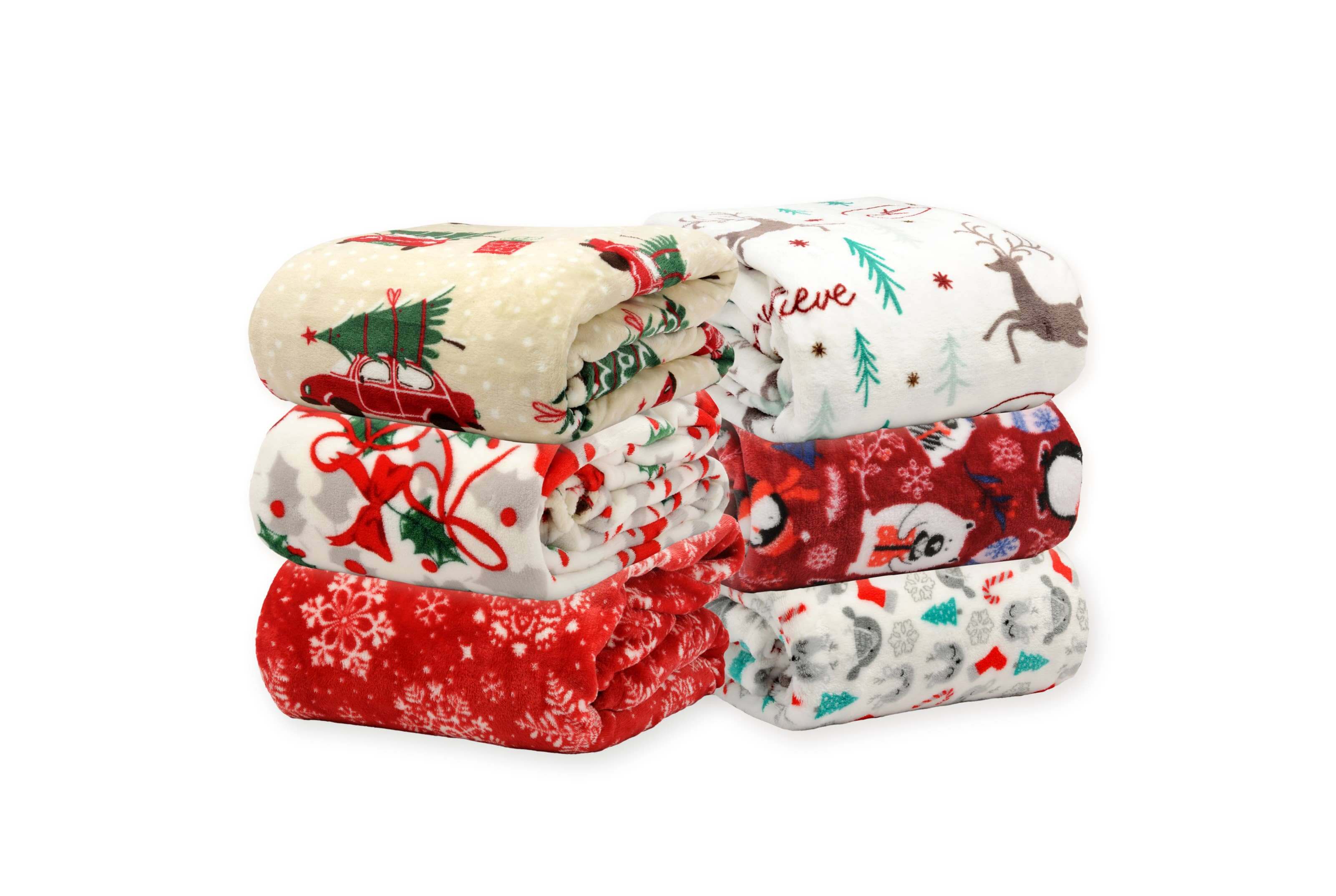 Christmas Cheer Plush Throw Blankets by Kathy Ireland in festive designs stacked neatly for cozy winter nights.