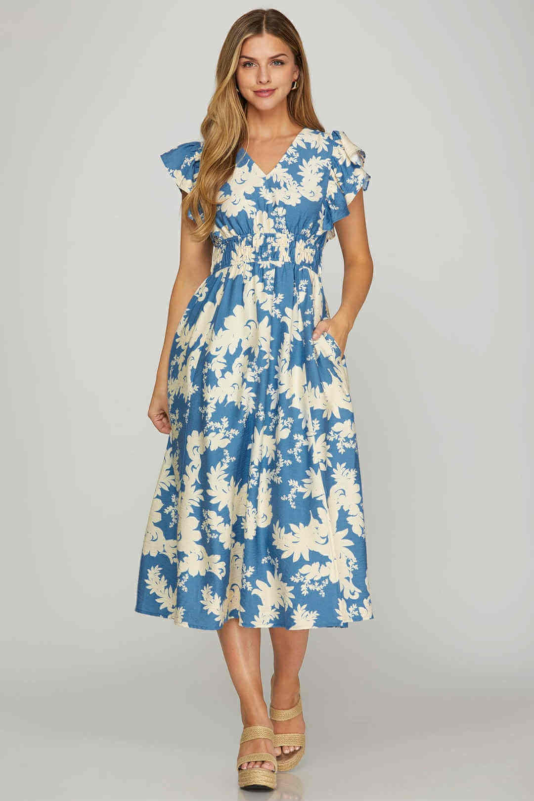Lakeside Serenade Dress by She + Sky in blue and cream floral print, perfect for summer outings and brunch dates.