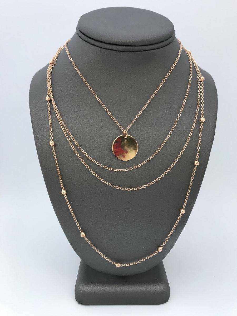 Layered Around The World Necklace Set featuring a round pendant and bead accents, designed for effortless chic style.