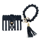 LULU MAC BLACK/WHITE WRISTLET featuring black and white stripes, beaded keychain, and tassel for easy carrying.