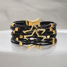 LUCKY STARS Bracelet by Teal Tiger Boutique $14.00 Elegant black woven bracelet featuring a magnetic clasp and a stunning gold colored star design. Teal Tiger Boutique