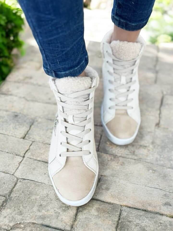 Cream VERY G Star Bright high top sneakers with glitter details and sherpa accents.