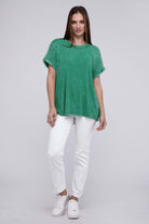 Stylish kelly green oversized top by Zenana, made of ribbed, mineral washed fabric, paired with white pants.