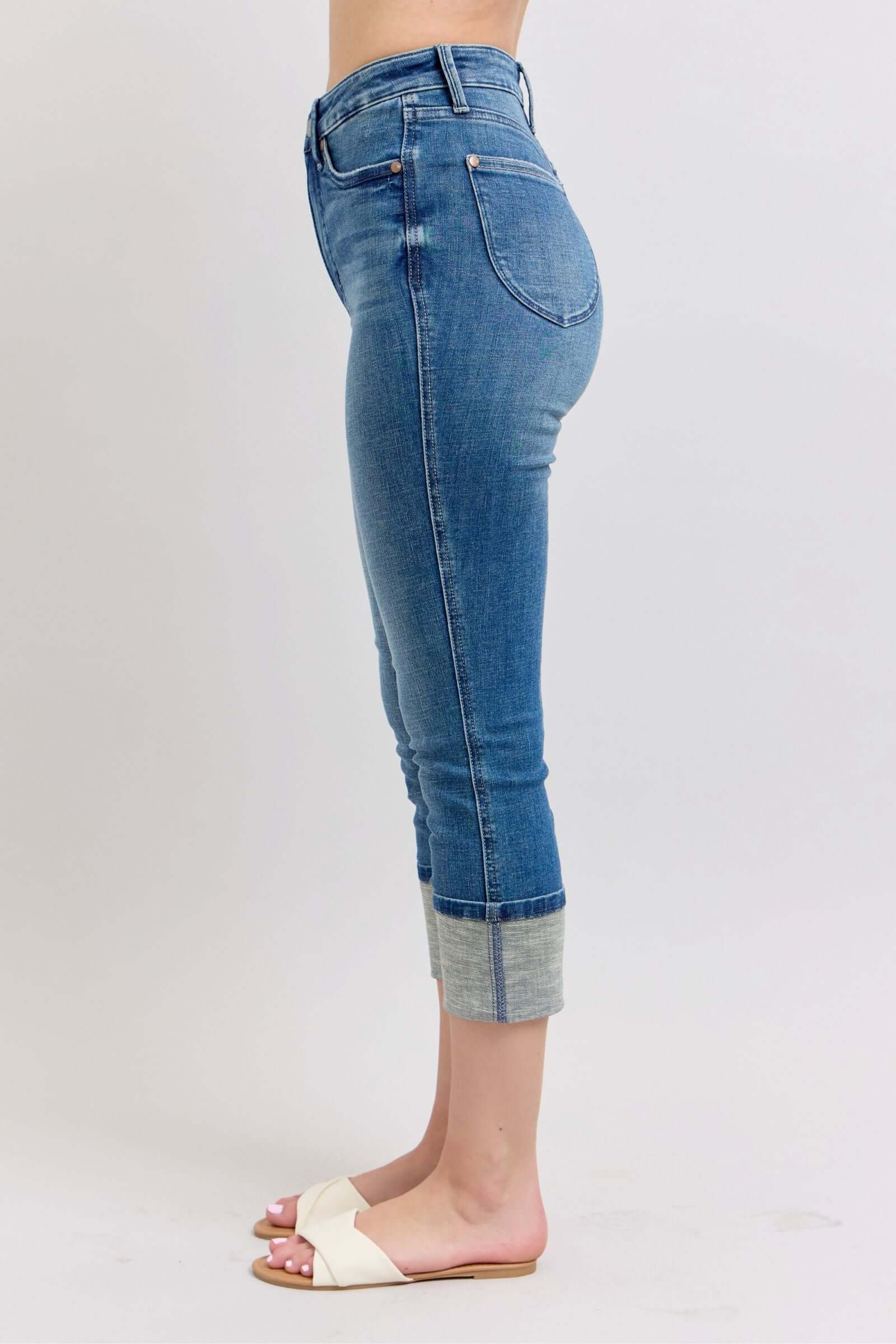 High waist medium wash Judy Blue capris with cuffed hem and tummy control feature.