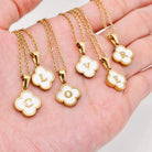 MONOGRAM MOMENTS NECKLACE showcasing elegant gold pendants with white initials CLOVER.