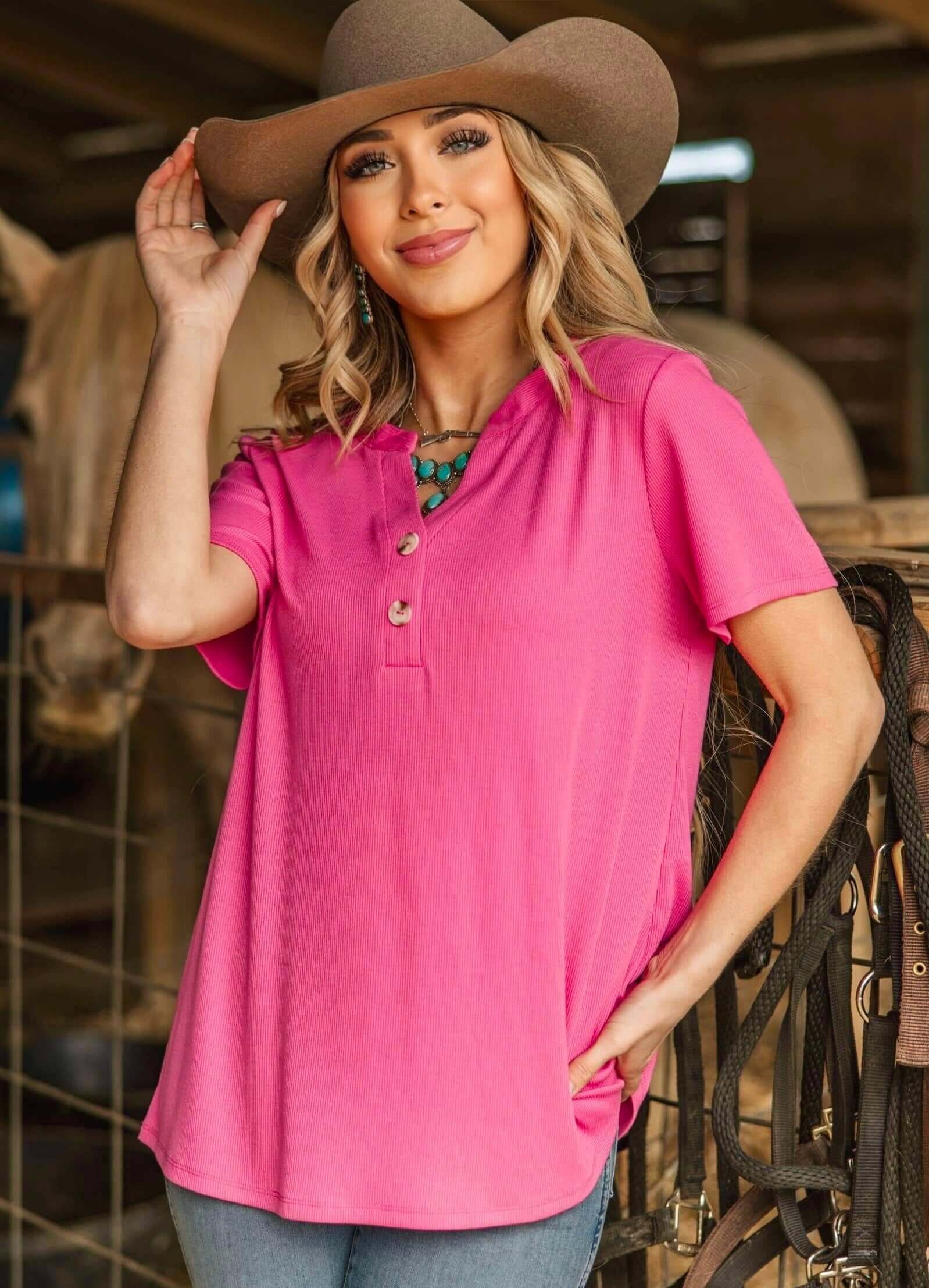 Everyday Energy Top by Andrée in pink, featuring a relaxed fit and button detail for effortless style.