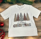 White Christmas tee with leopard and plaid tree design, featuring "Merry Christmas" text, festive holiday apparel by Bella Canvas.