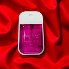 ASHLEY LAURA XL Cinnamon Vanilla HAND SANITIZER in a pink bottle on a red background