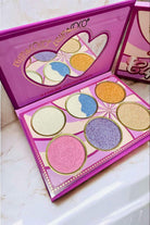 Cupid Hey Eyeshadow Palette by Kevin & Coco featuring six bold, blendable shades in a heart-shaped case.