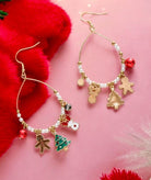 Gingerbread earrings by Vivian-Lu featuring festive charms, pearls, and gold beads, perfect for holiday cheer and sparkle.