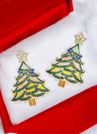 Evergreen Christmas Tree Earrings adorned with rhinestones, featuring colorful branches and sparkly stars in a gift box.