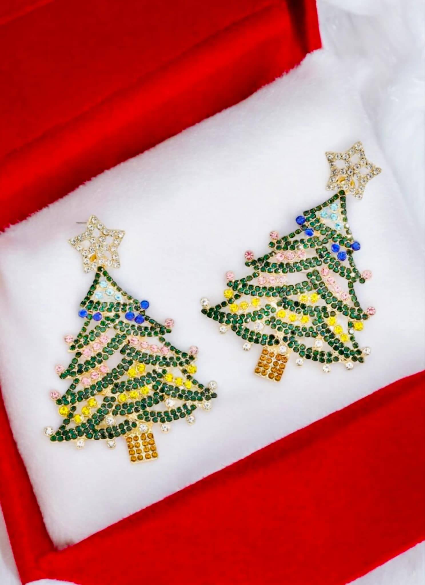 Evergreen Christmas Tree Earrings adorned with rhinestones, featuring colorful branches and sparkly stars in a gift box.