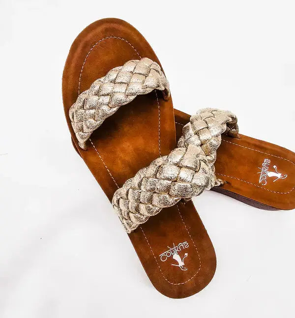 Corkys Wind It Up gold sandals with braided straps and cushioned footbed, perfect for stylish comfort.