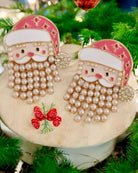 Festive Father Christmas earrings featuring faux pearl beard and rhinestones, perfect for holiday celebrations.