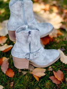 MERLOT LOW BOOTIES IN Cream by: VERY G by Very G $69.00 Cowgirl up any outfit with these ultra-cute Merlot Low Booties by Very G in Cream Gray! Boasting a leather-look, an almond-shaped toe, and a cool western-style strap fastened with a silver ring, thes